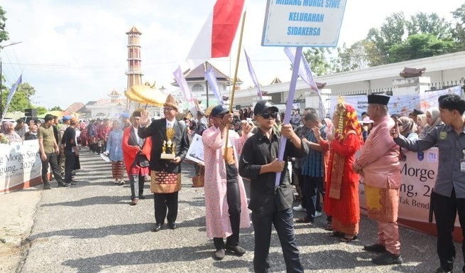 Pesona Midang Morge Siwe: Arak-arakan Busana Adat di OKI